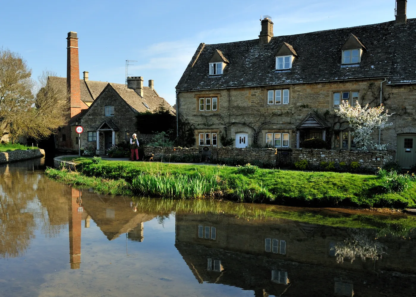 Stone cottages beside the River Eye in Lower Slaughter